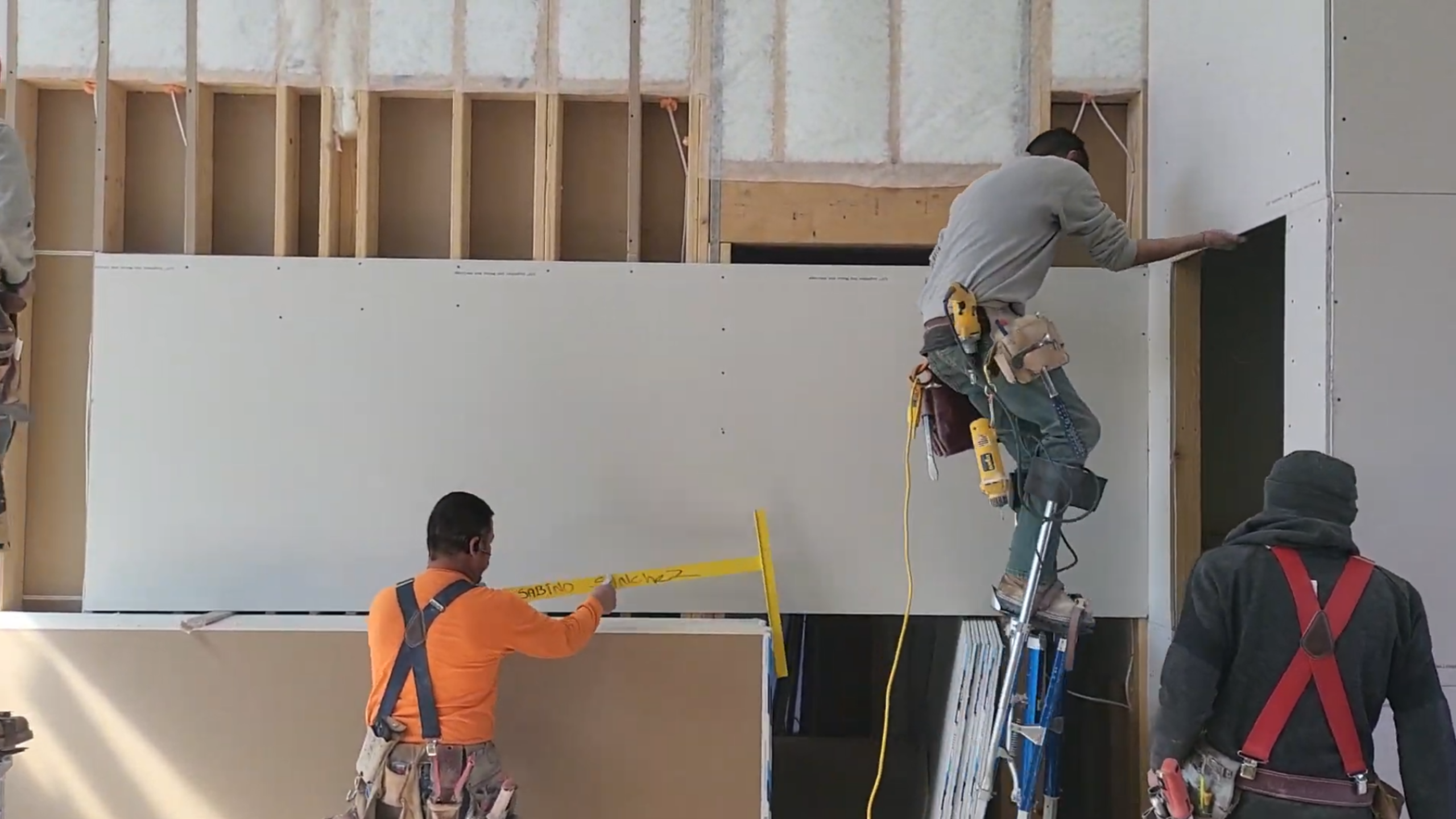 Drywall contractors working