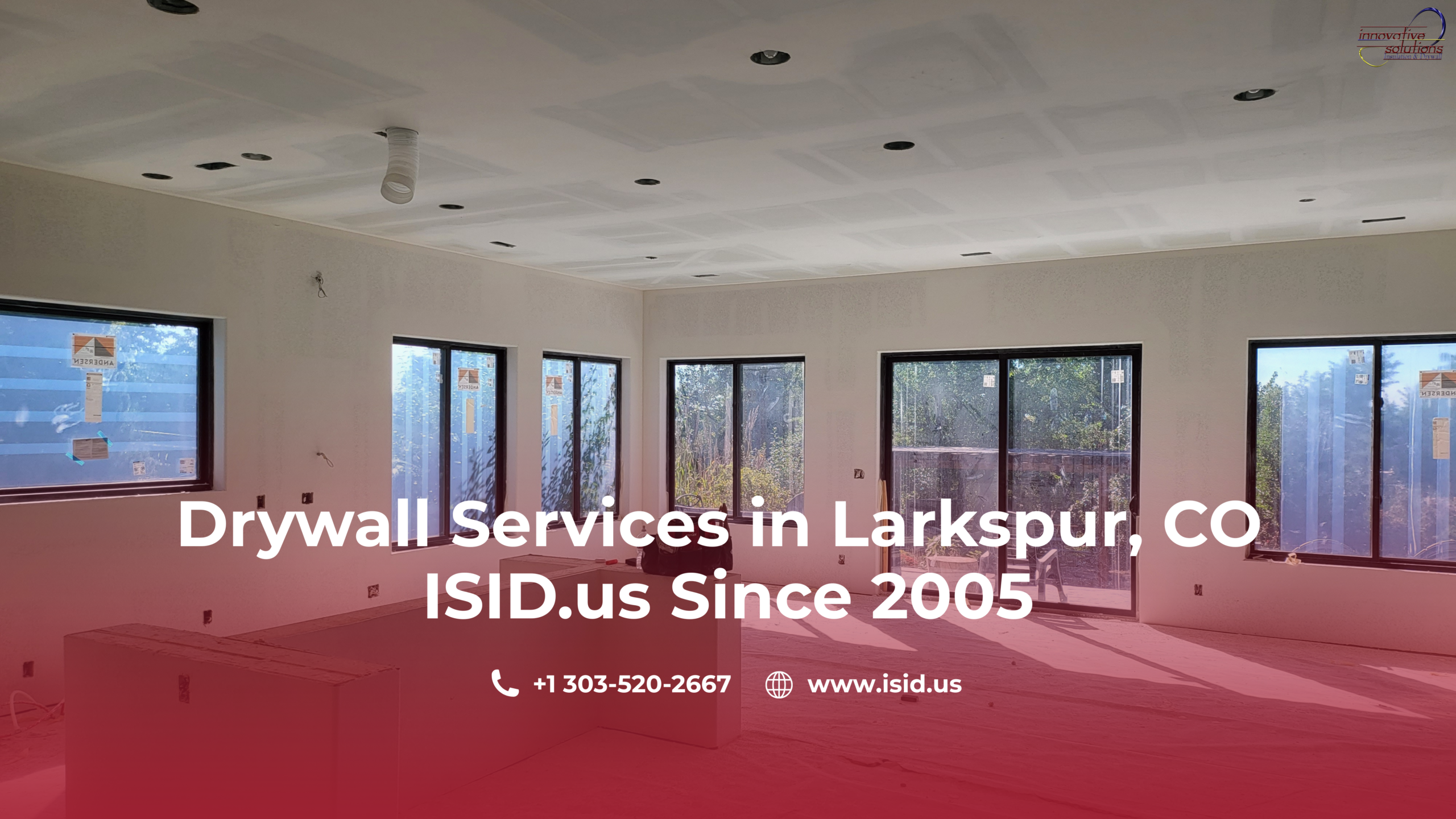 Bright modern commercial interior in Larkspur, Colorado featuring newly installed and finished drywall with smooth ceilings, large black-framed windows, abundant natural light, and an unfinished floor ready for the next stage of construction.